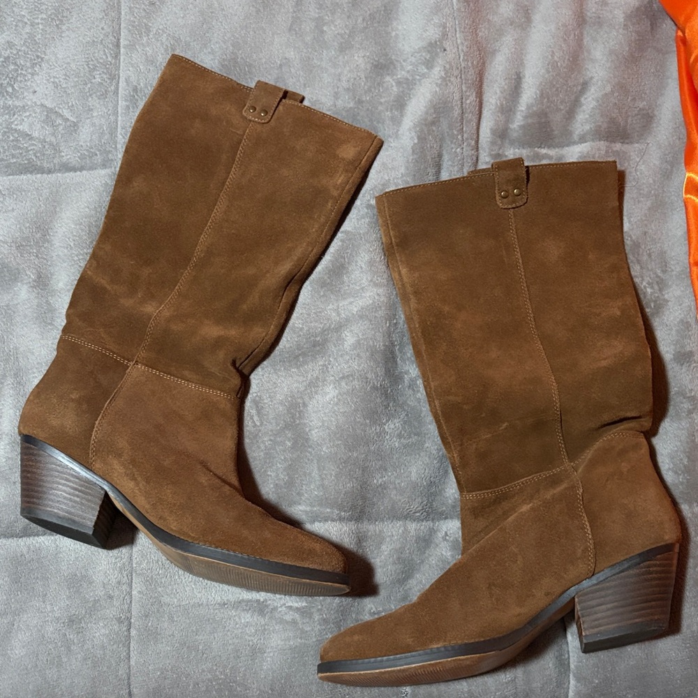 Genuine Cowboy boots - stitching is superb! Very comfy and cute!